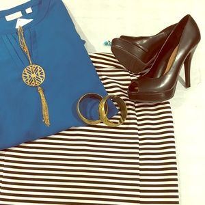 Brand new Knee length stripped skirt